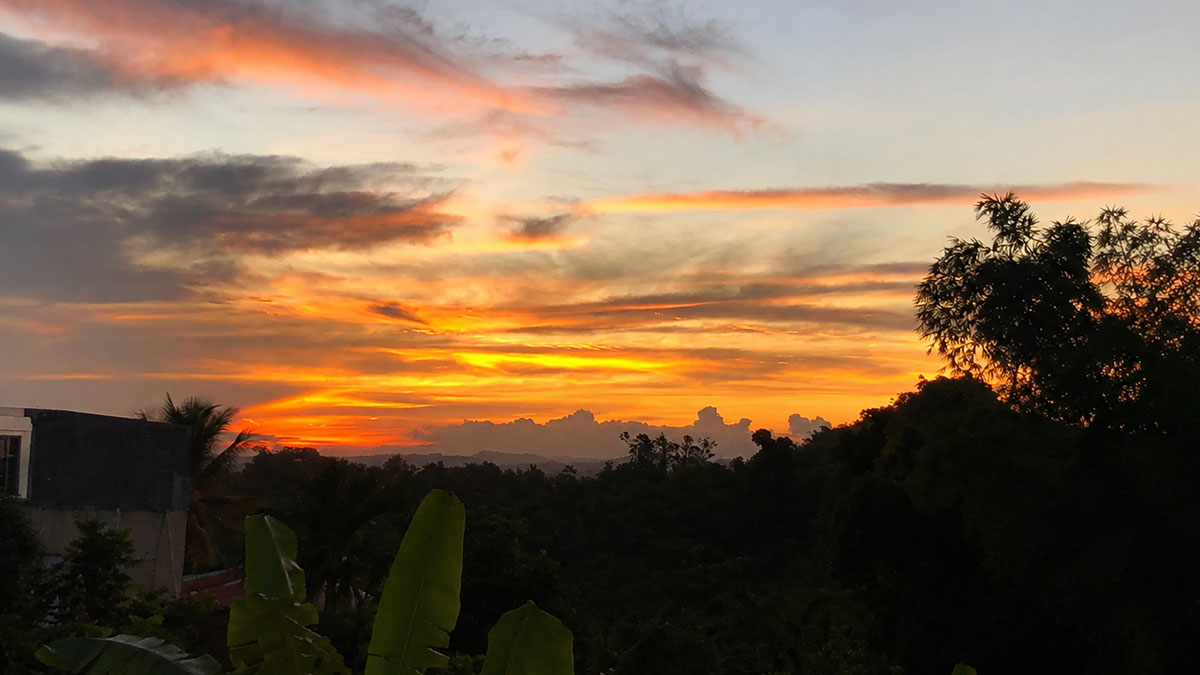 Golden sunset over the valley from the terrace